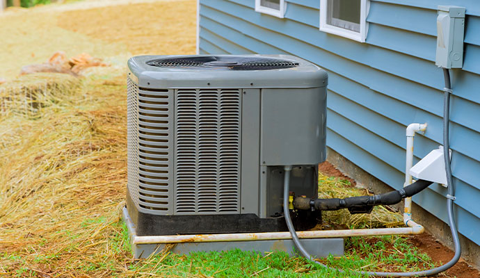 An installed HVAC outdoor unit