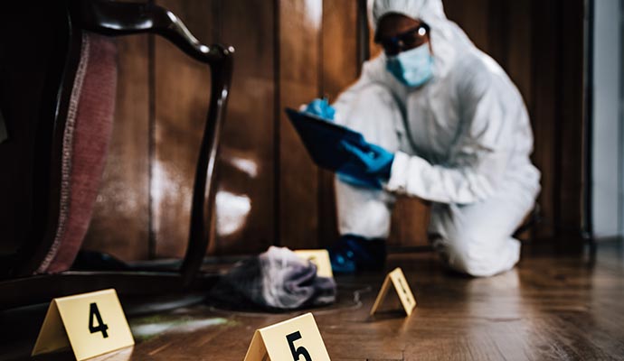 Specialist documenting evidence at crime scene