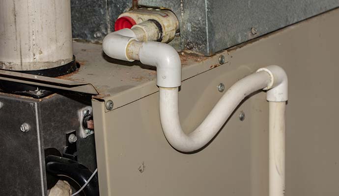 Close-up view of a AC drain pipe