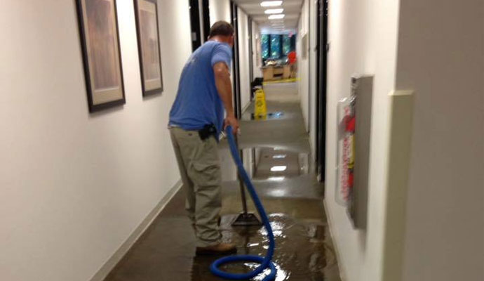 Water extraction in hallway with equipment