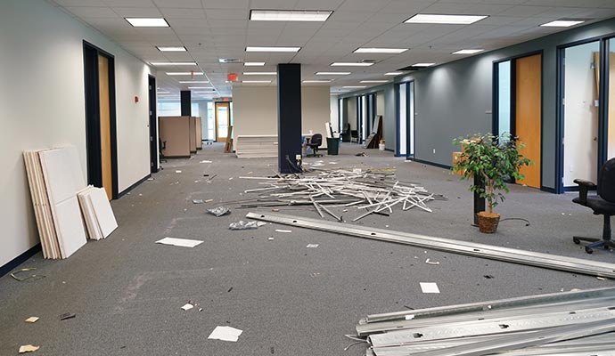 Debris scattered across a commercial office renovation site.