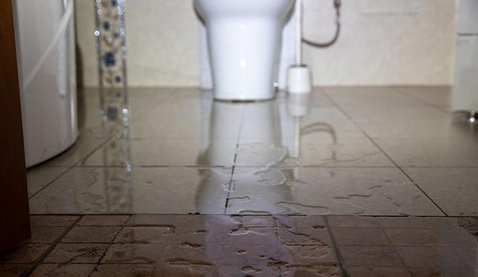 Sewage damage bathroom floor