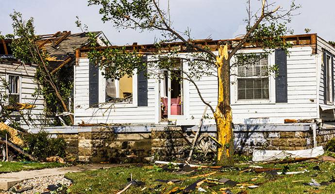 House and trees damaged by tornado