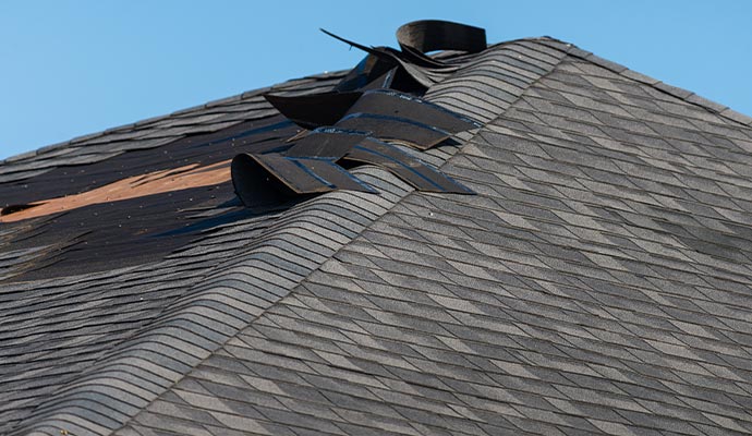 Roof damaged by hurricane