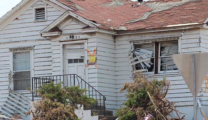 Tropical storm damaged house