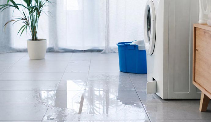 Washing machine leak on tiled floor