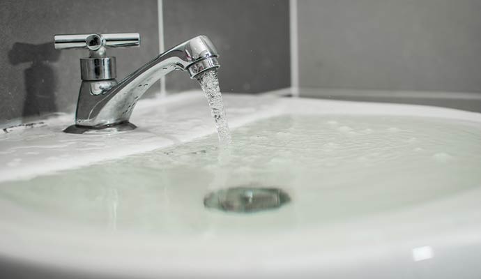 Bathroom Sink Overflow Cleanup in Raleigh-Durham, NC, SC, and TN