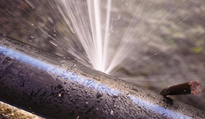Burst black water line spraying