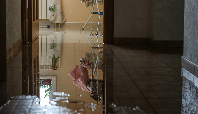 Flooded hallway with standing water