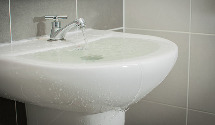 Overflowing bathroom sink