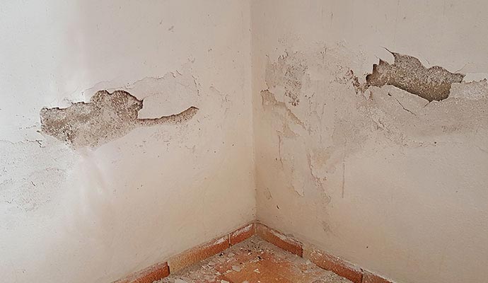 Structurally damaged wall