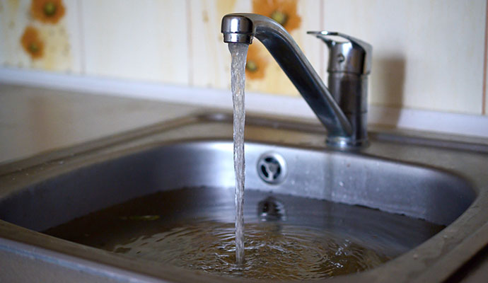 Water running on kitchen sink
